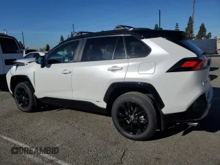 2024 Toyota RAV4 Hybrid XSE with VIN 2T3E6RFV4RW060903, listed as a Copart auction lot 49515785 with 8,637 mi miles and Salvage Title. Bid and sale history available at DreamBid. Image 2.