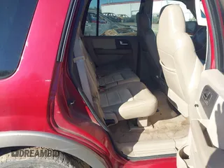2004 Ford Expedition Eddie Bauer with VIN 1FMPU17L74LB55900, listed as a IAAI auction lot 41667029 with 380,947 mi miles. Bid and sale history available at carsss.com. Image 8.