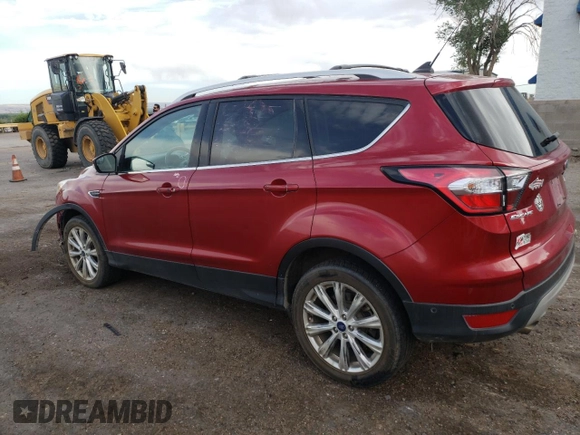 2018 Ford Escape Titanium with VIN 1FMCU9J94JUC62242, listed as a Copart auction lot 59770835 with 139,316 mi miles and Salvage title. Bid and sale history available at DreamBid. Image 2.