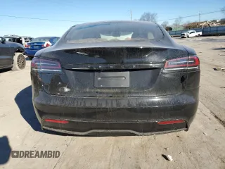 2023 Tesla Model S with VIN 5YJSA1E5XPF519570, listed as a Copart auction lot 80573863 with Not provided miles and Salvage title. Bid and sale history available at DreamBid. Image 6.
