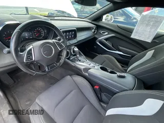 2021 Chevrolet Camaro 1LT with VIN 1G1FB1RS0M0109877, listed as a Copart auction lot 57296035 with 26,486 mi miles and Salvage title. Bid and sale history available at DreamBid. Image 9.