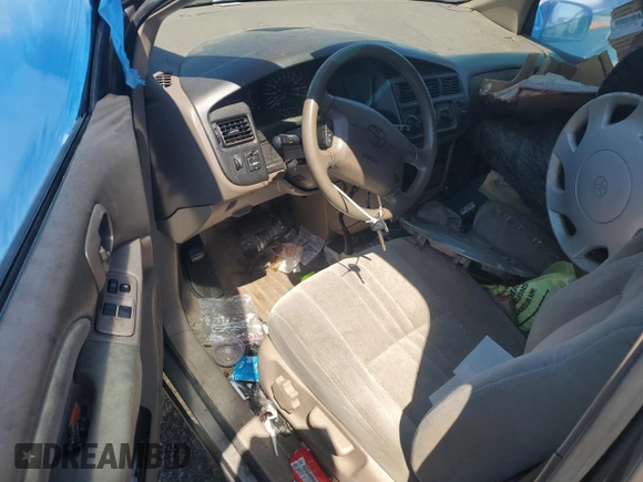 1999 Toyota Sienna CE z VIN 4T3ZF19C4XU163765, wystawiony jako Copart lot #54405805 z przebiegiem Nie podano mil oraz Szkoda całkowita • Salvage title. Historia ofert i sprzedaży dostępna na DreamBid. Obrazek 8.