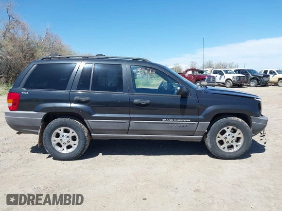1999 Jeep Grand Cherokee Laredo with VIN 1J4GW58S8XC524502, listed as a IAAI auction lot 42193506 with 147,920 mi miles and . Bid and sale history available at DreamBid. Image 14.