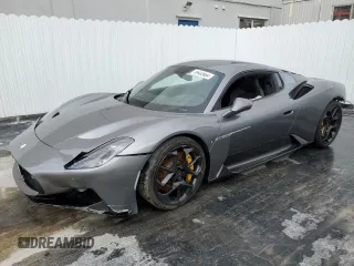 2022 Maserati MC20 z VIN ZAM24BXA4N0383807, wystawiony jako Copart lot #78432664 z przebiegiem Nie podano mil oraz Szkoda całkowita • Salvage title. Historia ofert i sprzedaży dostępna na DreamBid. Obrazek 1.