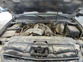 2007 Chevrolet Tahoe LT z VIN 1GNFK130X7J373208, wystawiony jako Copart lot #60710515 z przebiegiem 304 885 mil mil oraz Szkoda całkowita • Salvage title. Historia ofert i sprzedaży dostępna na DreamBid. Obrazek 12.