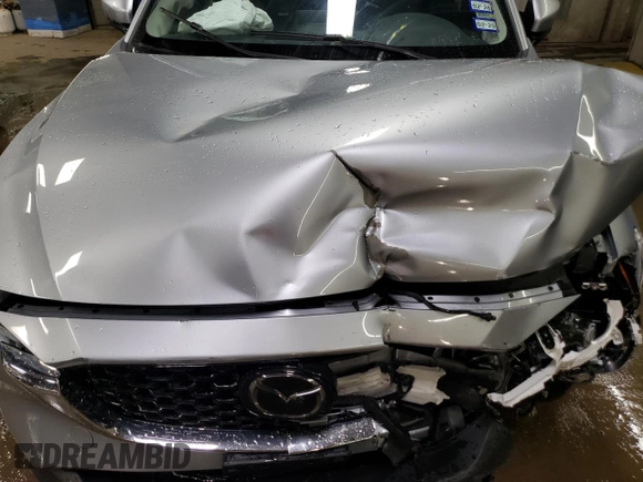 2023 Mazda CX-5 S Premium with VIN JM3KFBDM8P0203834, listed as a Copart auction lot 52496815 with 54,306 mi miles and Non Repairable. Bid and sale history available at DreamBid. Image 11.
