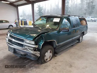 1997 Chevrolet Suburban with VIN 3GNFK16R6VG118242, listed as a IAAI auction lot 41349416 with 183,439 mi miles. Bid and sale history available at carsss.com. Image 2.