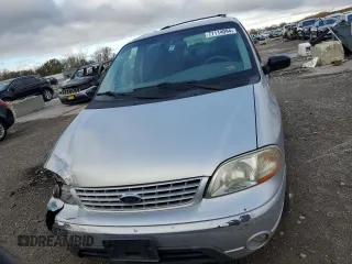 2003 Ford Windstar LX z VIN 2FMZA51433BA70321, wystawiony jako Copart lot #77114094 z przebiegiem 125 267 mil mil oraz Szkoda całkowita • Salvage title. Historia ofert i sprzedaży dostępna na DreamBid. Obrazek 5.