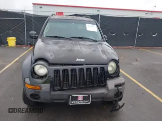 2003 Jeep Liberty Sport with VIN 1J4GK48KX3W656837, listed as a IAAI auction lot 40785615 with 164,450 mi miles and . Bid and sale history available at DreamBid. Image 12.