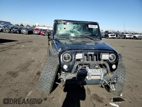 2009 Jeep Wrangler Rubicon with VIN 1J4GA64169L765933, listed as a Copart auction lot 84963104 with 107,190 mi miles and Salvage Title. Bid and sale history available at DreamBid. Image 11.