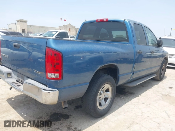 2002 Dodge 1500 z VIN 3D7HA18N52G164550, wystawiony jako IAAI lot #42293158 z przebiegiem 208 291 mil mil oraz . Historia ofert i sprzedaży dostępna na DreamBid. Obrazek 4.