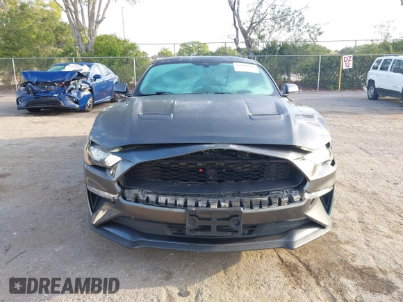 2018 Ford Mustang EcoBoost with VIN 1FA6P8THXJ5172021, listed as a IAAI auction lot 42170389 with 71,772 mi miles and . Bid and sale history available at DreamBid. Image 6.