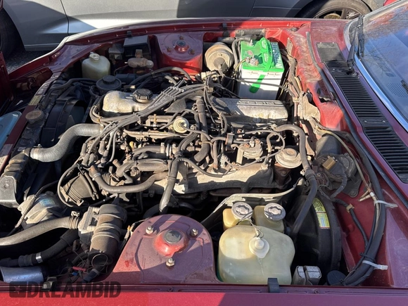1980 Datsun 280ZX z VIN HS130198111, wystawiony jako Copart lot #84153084 z przebiegiem 106 400 mil mil oraz Tytuł czysty. Historia ofert i sprzedaży dostępna na DreamBid. Obrazek 7.