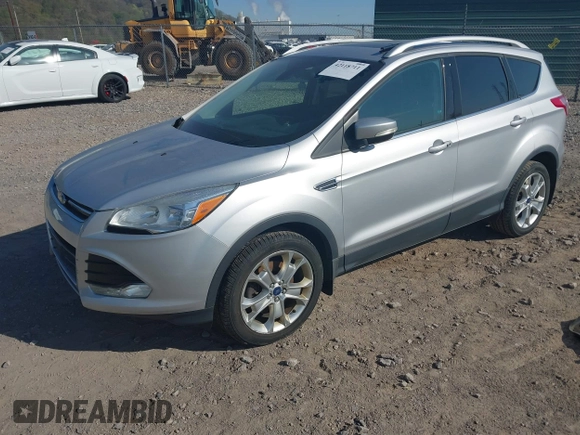 2016 Ford Escape Titanium with VIN 1FMCU9JX2GUA50916, listed as a IAAI auction lot 42118711 with 121,405 mi miles. Bid and sale history available at carsss.com. Image 2.