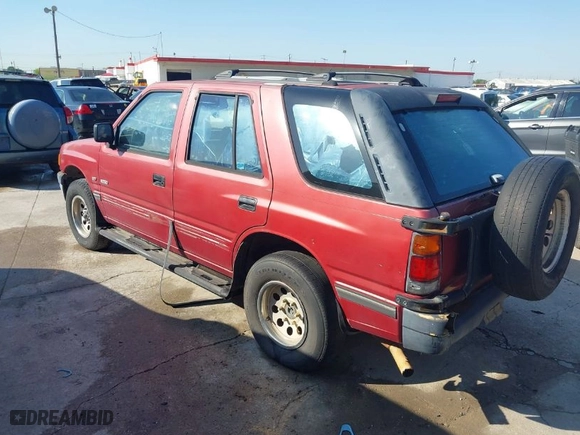 1994 Isuzu Rodeo LS with VIN 4S2CG58VXR4327327, listed as a IAAI auction lot 41959576 with 169,794 mi miles. Bid and sale history available at carsss.com. Image 3.