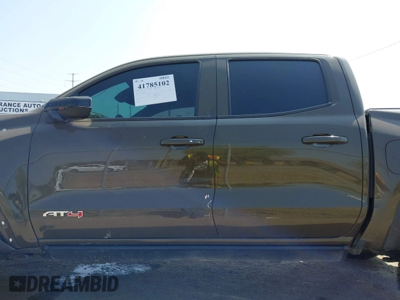 2023 GMC Canyon 4WD AT4 with VIN 1GTP6DEK5P1231432, listed as a IAAI auction lot 41785102 with 33,154 mi miles and . Bid and sale history available at carsss.com. Image 15.