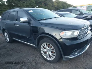 2014 Dodge Durango Citadel with VIN 1C4RDJEG3EC277996, listed as a IAAI auction lot 40517339 with Not Provided miles and . Bid and sale history available at DreamBid. Image 1.