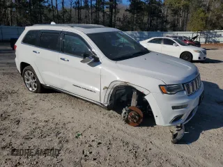 2019 Jeep Grand Cherokee Summit with VIN 1C4RJFJG9KC805435, listed as a Copart auction lot 41607055 with 90,403 mi miles and Salvage Title. Bid and sale history available at carsss.com. Image 4.