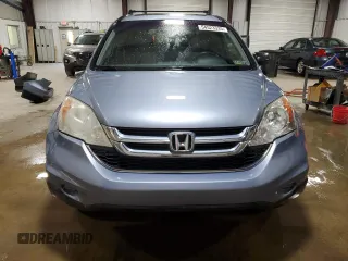 2010 Honda CR-V EX with VIN 5J6RE4H51AL012104, listed as a Copart auction lot 54523335 with 128,736 mi miles and Salvage Title. Bid and sale history available at carsss.com. Image 5.