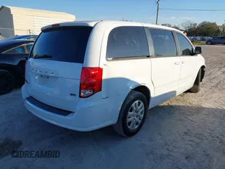2014 Dodge Grand Caravan SE with VIN 2C4RDGBG1ER220534, listed as a IAAI auction lot 41262990 with 77,851 mi miles and . Bid and sale history available at DreamBid. Image 4.