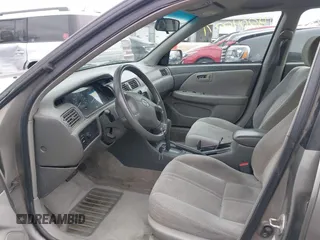 2001 Toyota Camry CE with VIN 4T1BG22K01U060588, listed as a IAAI auction lot 42040071 with 165,446 mi miles and . Bid and sale history available at DreamBid. Image 5.