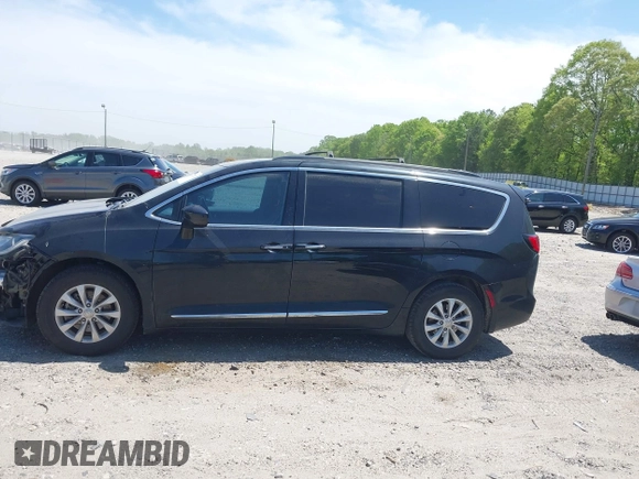 2017 Chrysler Pacifica Touring L with VIN 2C4RC1BG7HR539716, listed as a IAAI auction lot 42037822 with 160,623 mi miles and . Bid and sale history available at DreamBid. Image 15.
