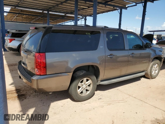 2013 GMC Yukon XL SLT with VIN 1GKS1KE09DR305240, listed as a Copart auction lot 53143565 with 210,872 mi miles and Salvage Title. Bid and sale history available at DreamBid. Image 3.