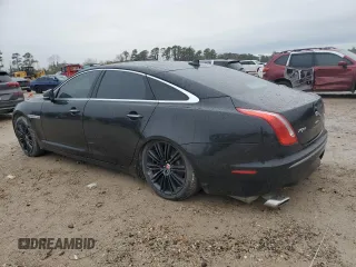 2014 Jaguar XJ Portfolio z VIN SAJWA2GZ2E8V64993, wystawiony jako Copart lot #88774965 z przebiegiem Nie podano mil oraz Szkoda całkowita • Salvage title. Historia ofert i sprzedaży dostępna na DreamBid. Obrazek 2.