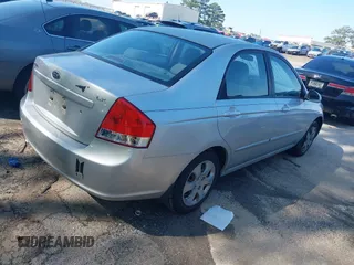 2009 Kia Spectra EX with VIN KNAFE221695647240, listed as a IAAI auction lot 41994191 with 237,101 mi miles. Bid and sale history available at carsss.com. Image 4.