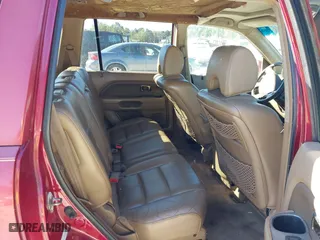 2006 Honda Pilot EX-L with VIN 5FNYF18566B022909, listed as a IAAI auction lot 40576412 with 310,278 mi miles. Bid and sale history available at carsss.com. Image 8.