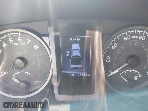 2018 Toyota Tacoma SR5 with VIN 3TMAZ5CN6JM055632, listed as a IAAI auction lot 40751593 with 125,663 mi miles and . Bid and sale history available at DreamBid. Image 7.