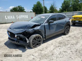 2022 Mazda CX-30 S Carbon Edition с VIN 3MVDMBCL0NM434395, выставлен на аукционе Copart как лот 56247715 с пробегом 40 698 миль миль и На запчасти • Non repairable. История ставок и продаж доступна на DreamBid. Изображение 1.