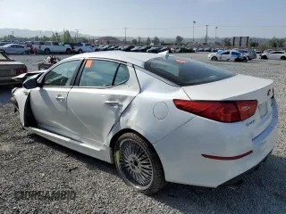 2014 Kia Optima SX with VIN 5XXGR4A77EG310630, listed as a Copart auction lot 57258405 with 100,191 mi miles and Salvage title. Bid and sale history available at DreamBid. Image 2.