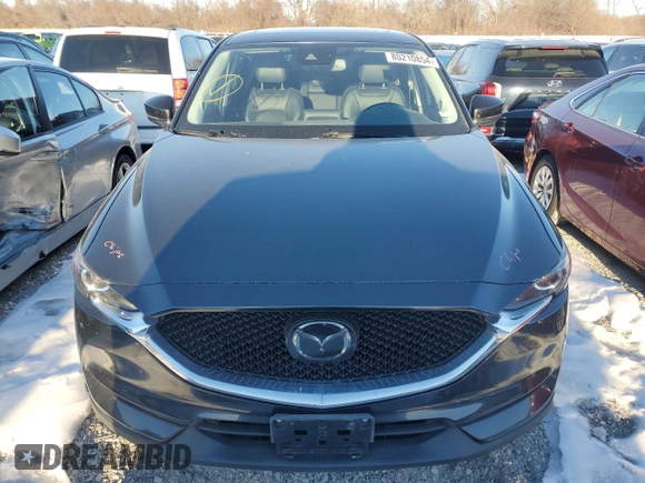2018 Mazda CX-5 Touring z VIN JM3KFACM9J0300642, wystawiony jako Copart lot #80210854 z przebiegiem 118 309 mil mil oraz Szkoda całkowita • Salvage title. Historia ofert i sprzedaży dostępna na DreamBid. Obrazek 5.