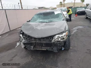 2014 Toyota Camry Hybrid LE with VIN 4T1BD1FK2EU134838, listed as a IAAI auction lot 41912000 with 132,000 mi miles. Bid and sale history available at carsss.com. Image 6.