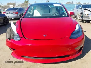 2021 Tesla Model 3 Long Range with VIN 5YJ3E1EBXMF990242, listed as a IAAI auction lot 41674222 with 24,554 mi miles and . Bid and sale history available at DreamBid. Image 12.