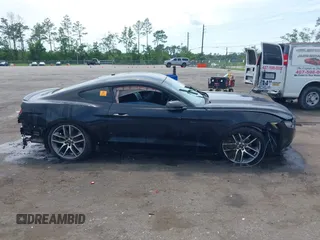 2015 Ford Mustang EcoBoost with VIN 1FA6P8TH5F5374241, listed as a IAAI auction lot 42556786 with 140,017 mi miles and . Bid and sale history available at DreamBid. Image 13.