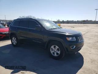 2014 Jeep Grand Cherokee Laredo with VIN 1C4RJEAGXEC217249, listed as a Copart auction lot 48585195 with 131,635 mi miles and Salvage Title. Bid and sale history available at DreamBid. Image 4.