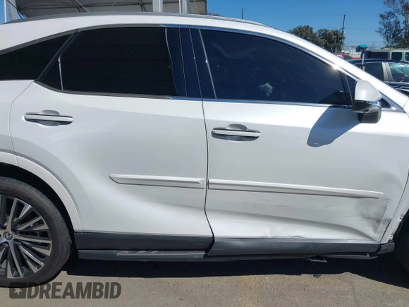 2024 Lexus RX with VIN 2T2BAMBA3RC022849, listed as a IAAI auction lot 41819024 with 8,936 mi miles. Bid and sale history available at carsss.com. Image 13.