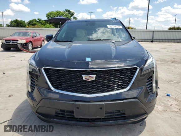 2021 Cadillac XT4 AWD Sport with VIN 1GYFZFR43MF054379, listed as a Copart auction lot 55338315 with 53,693 mi miles and Salvage title. Bid and sale history available at DreamBid. Image 5.