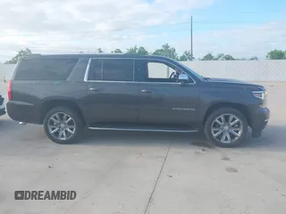2018 Chevrolet Suburban Premier with VIN 1GNSCJKC5JR135265, listed as a IAAI auction lot 42028935 with 136,382 mi miles and . Bid and sale history available at DreamBid. Image 13.