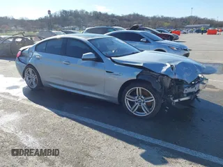 2015 BMW 6 Series 640i xDrive with VIN WBA6B8C52FD453433, listed as a IAAI auction lot 41805317 with 138,685 mi miles and . Bid and sale history available at carsss.com. Image 1.