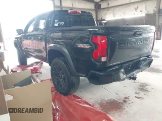 2023 Chevrolet Colorado 4WD Trail Boss with VIN 1GCPTEEK3P1261771, listed as a IAAI auction lot 42535710 with 30,000 mi miles and . Bid and sale history available at DreamBid. Image 3.
