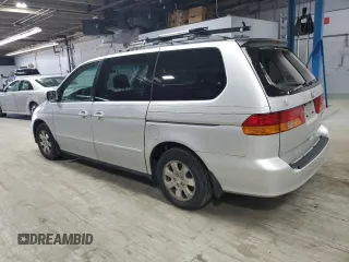 2002 Honda Odyssey EX with VIN 2HKRL18642H578718, listed as a Copart auction lot 59052525 with 170,928 mi miles and Salvage title. Bid and sale history available at DreamBid. Image 2.