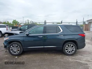 2018 Chevrolet Traverse Premier z VIN 1GNEVJKW4JJ240024, wystawiony jako IAAI lot #42369659 z przebiegiem 160 147 mil mil oraz . Historia ofert i sprzedaży dostępna na DreamBid. Obrazek 15.