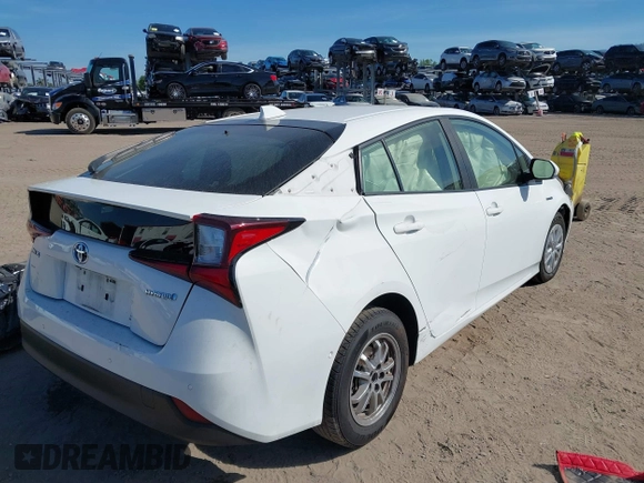 2021 Toyota Prius L Eco with VIN JTDKAMFU2M3147562, listed as a IAAI auction lot 41882066 with 99,491 mi miles. Bid and sale history available at carsss.com. Image 4.