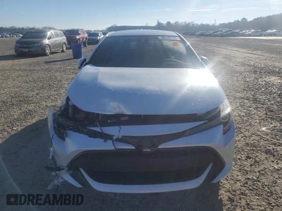 2021 Toyota Corolla Hatchback SE with VIN JTNB4MBEXM3104847, listed as a Copart auction lot 88339765 with 80,887 mi miles and Salvage Title. Bid and sale history available at carsss.com. Image 5.