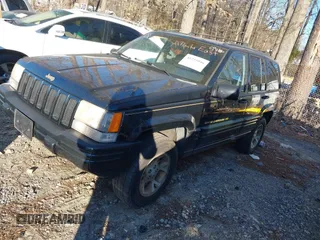 1997 Jeep Grand Cherokee Limited with VIN 1J4GZ78Y7VC688375, listed as a IAAI auction lot 41255946 with 216,544 mi miles. Bid and sale history available at carsss.com. Image 2.