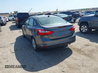 2013 Ford Focus SE with VIN 1FADP3F27DL156733, listed as a IAAI auction lot 41998196 with 116,692 mi miles. Bid and sale history available at carsss.com. Image 3.