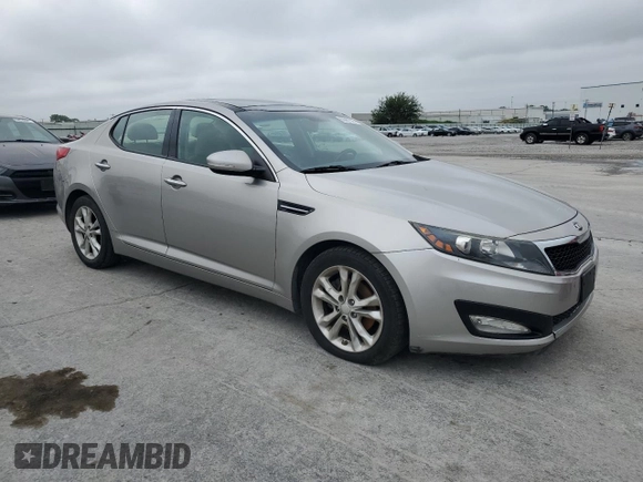 2013 Kia Optima EX z VIN 5XXGN4A76DG124488, wystawiony jako Copart lot #59487325 z przebiegiem 161 440 mil mil oraz Szkoda całkowita • Salvage title. Historia ofert i sprzedaży dostępna na DreamBid. Obrazek 4.